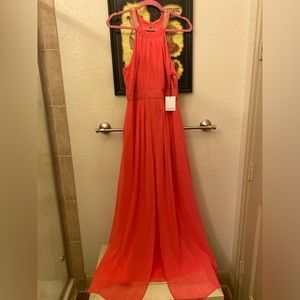 Calvin Klein long dress with gold design around neckline. Back zipper, size 10